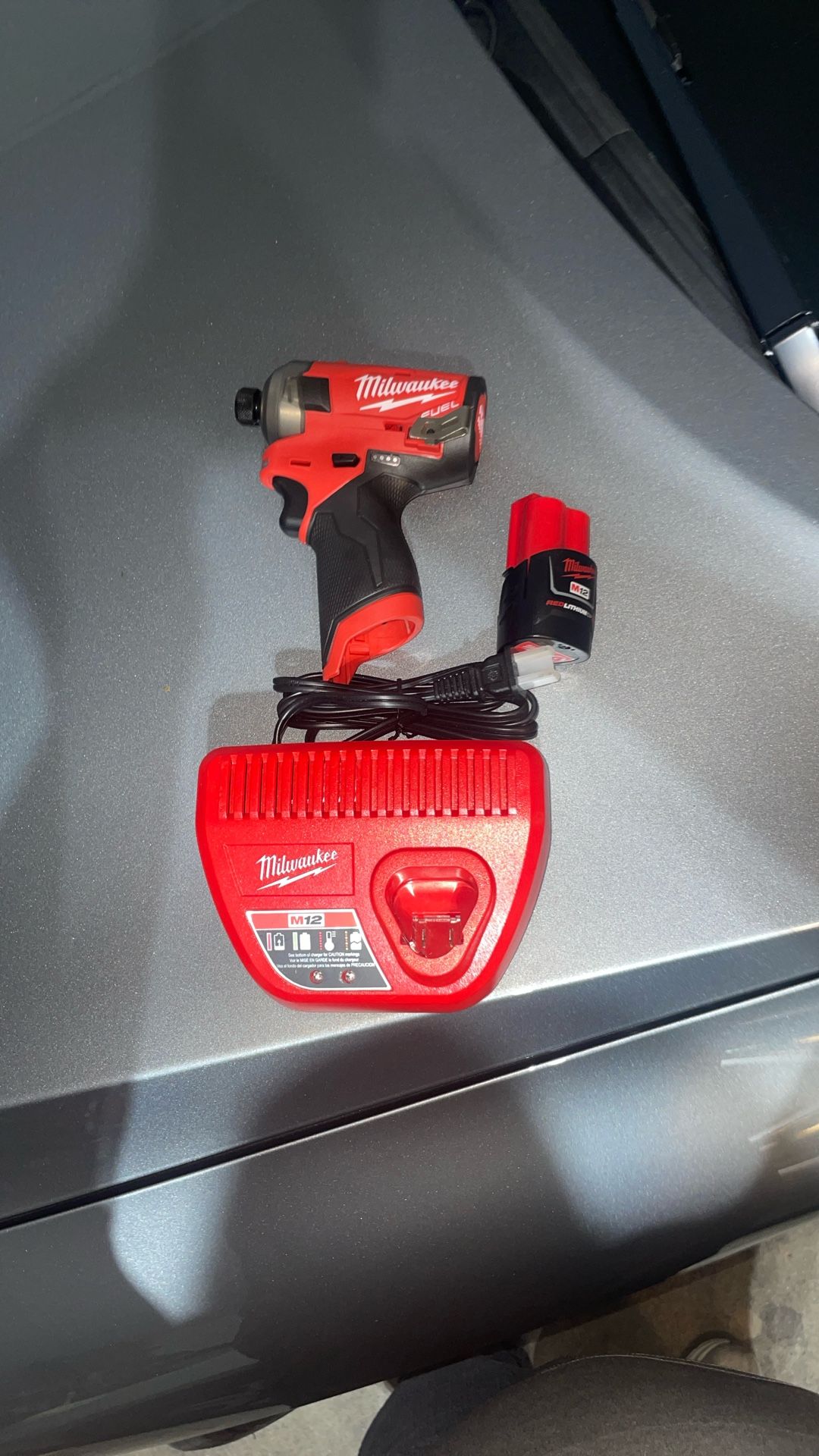 New Milwaukee Fuel M12 Impact Hex Hydraulic Driver SURGE 1/4 -w/ Battery 2.0ah And Charger- Pick Up Only