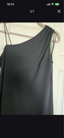 It’s very cute Dress from express the size is11-12 the color is Black and light green