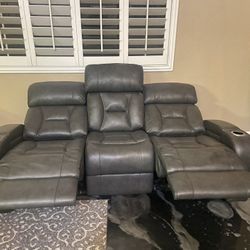 Gray Leather Sofa W/electric Recliners
