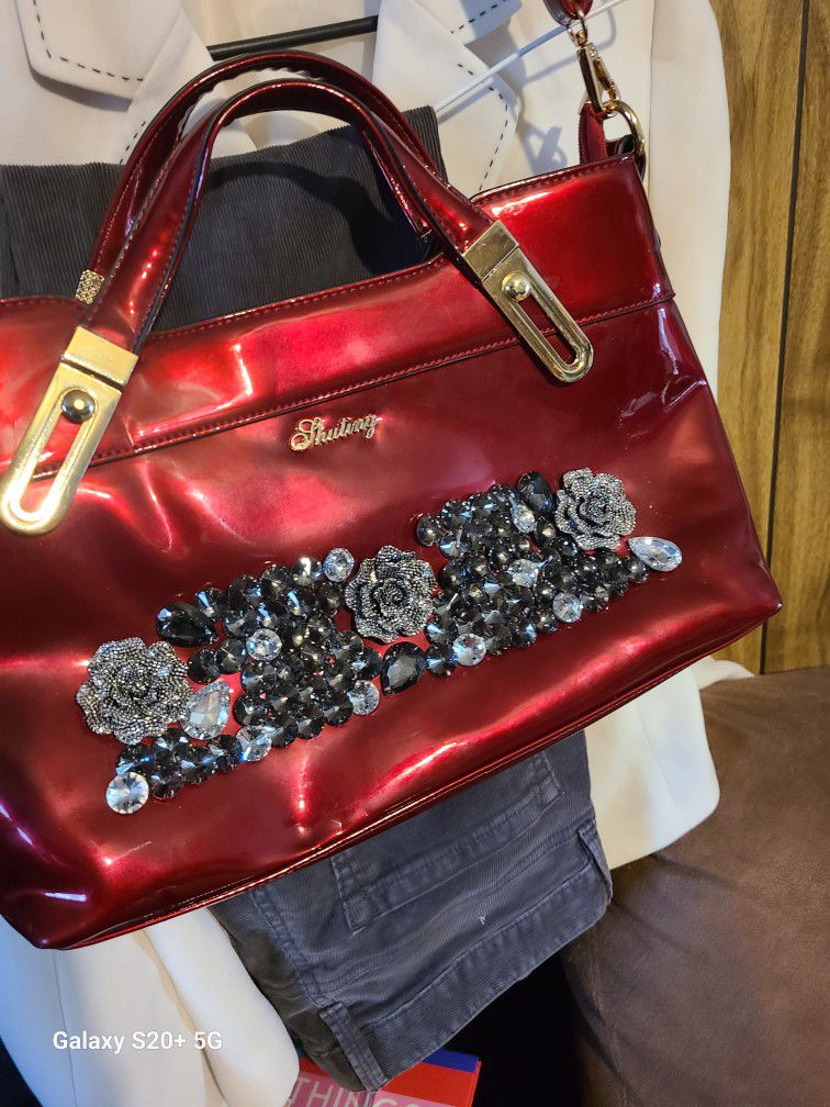 Ruby Red Purse Still Has The plastic On The Handles 