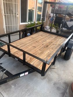 Utility trailer by SST trailers  5x8x1 PINK in my name  with NEW LED lights wood flooring in good shape semi NEW tires 5x4 ramp