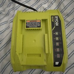 Two Ryobi Batteries And Charger 