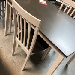 Brand new dinette, and four chairs, 399