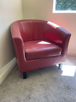 Red leather club chair- med sz- used in staging