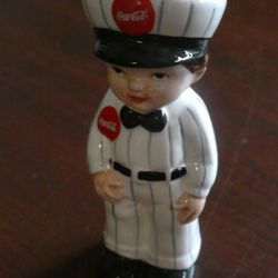 Vintage 1997 Porcelain Coca Cola Delivery Man Salt And Pepper Shakers Never Used Located In Palm Springs CA 