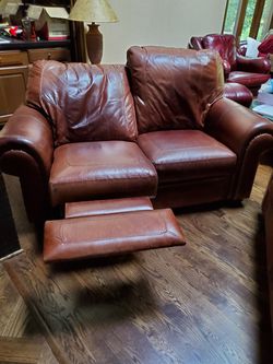 Leather loveseats 1 is power recliner