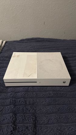 xbox One s with cables and controller