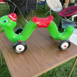 The Inchworm Radio Flyer, Can Bounce, Play On And Ride On ( Missing The Steering Wheel) (NO SHIPPING)