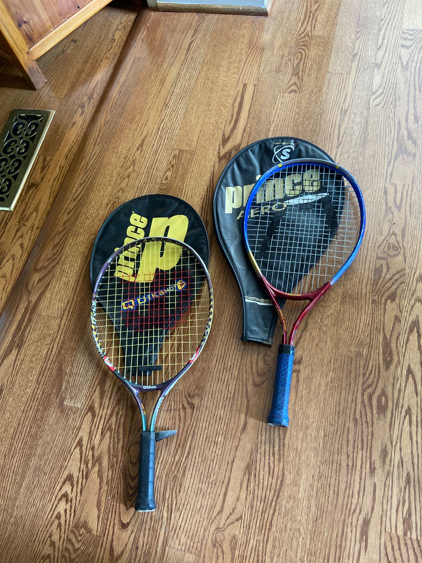 Head and riding tennis racket. Both children’s rackets