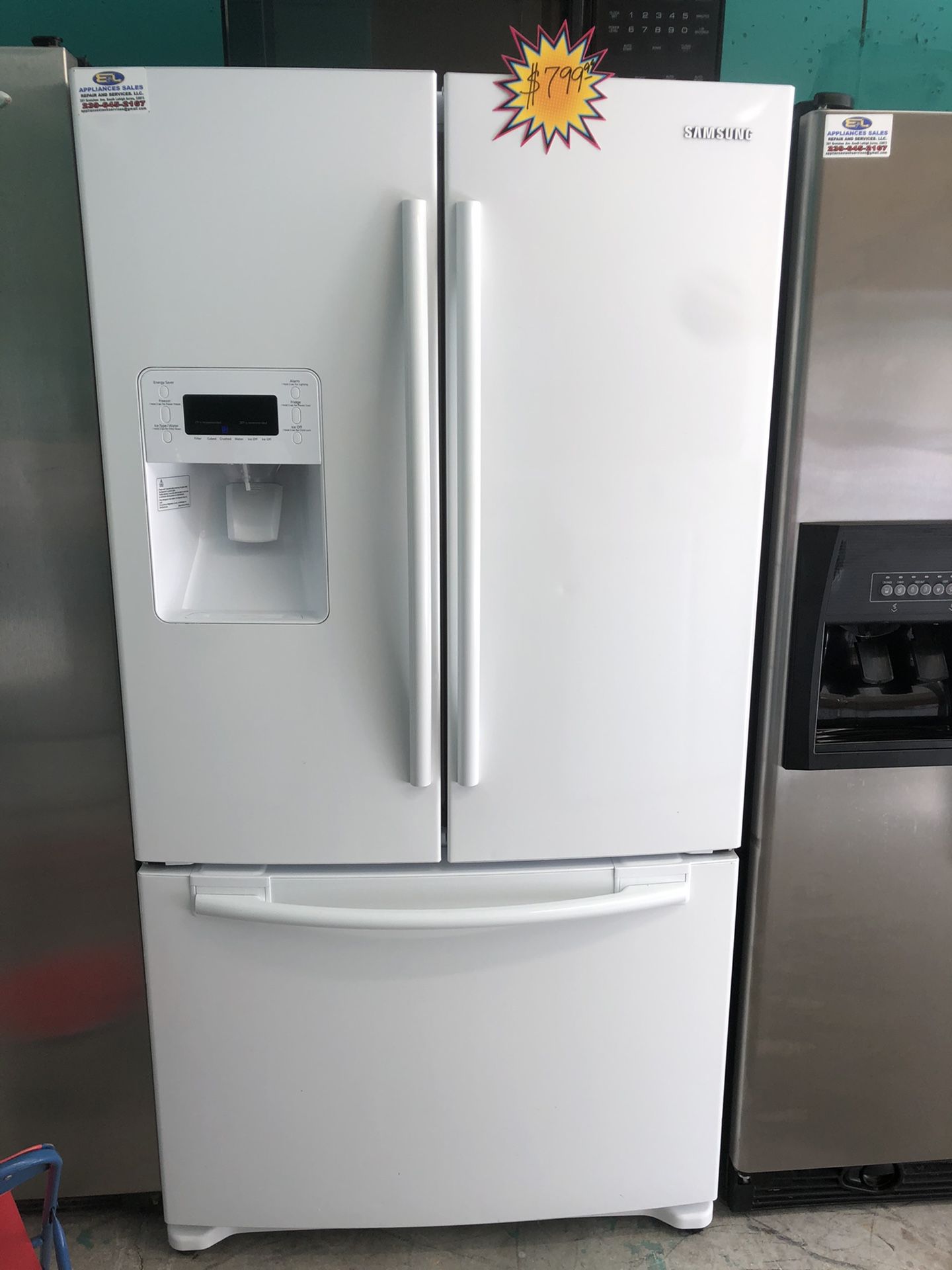 A Samsung White French door Refrigerator