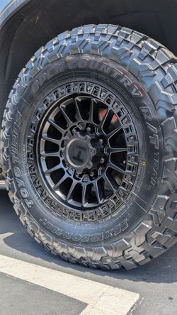 18x9 Hostile Battle with 35x12.50R18 Toyo Open Country RT Trails‼️ Ask For a Quote Today💥