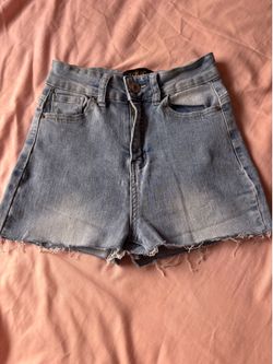 high rise light washed blue shorts