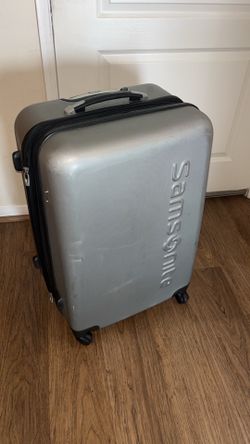 Large samsonite rolling luggage