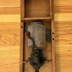 Antique Arcade No. 25 coffee grinder Mounted on an Antique Cabbage Shredder