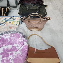 women pursesWomen's purses of different brands: West, Coach, Dune, Maurizio Tautini