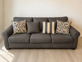 Gray Three-Seat Sofa with Decorative Pillows – $170 OBO