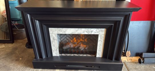 Electric Fireplace with Mantel Surround (it comes with the remote)