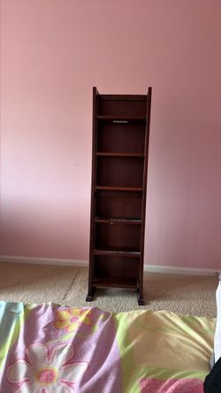 7 shelf book/tapes/DVD holder.