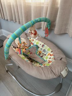 Winnie the Pooh vibrating baby bouncer
