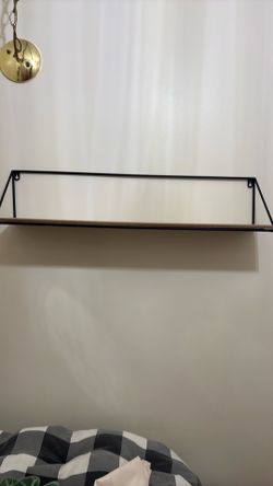 Black and brown shelve 30”wide x 7” height x 7 “ depth