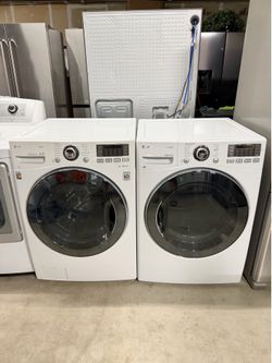 LG 4.0 cu.ft front load washer and 7.4 cu.ft electric dryer set