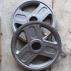 2-25lbs Olympic Weights 2inches. BRAND NEW