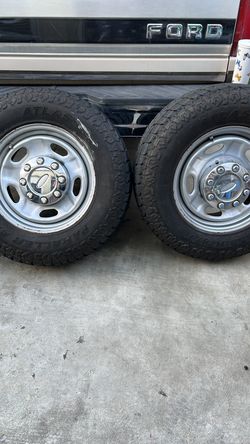 Four tires with rims