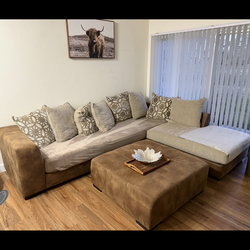 L shape sofa with ottoman and cushions