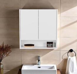 Newly Assembled Double-Door Medicine Cabinet with Mirrored Doors and Interior Shelves Sleek Bathroom