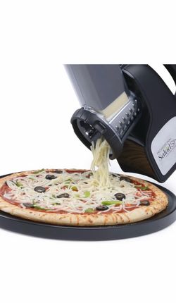 Electric cheese and vegetable chopper used Electric cheese and vegetable chopper used once