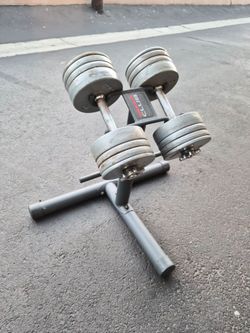 Pair of adjustable dumbbells 50lbs each