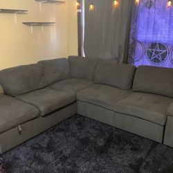 Large Grey Sectional With Storage, Turns Into Bed