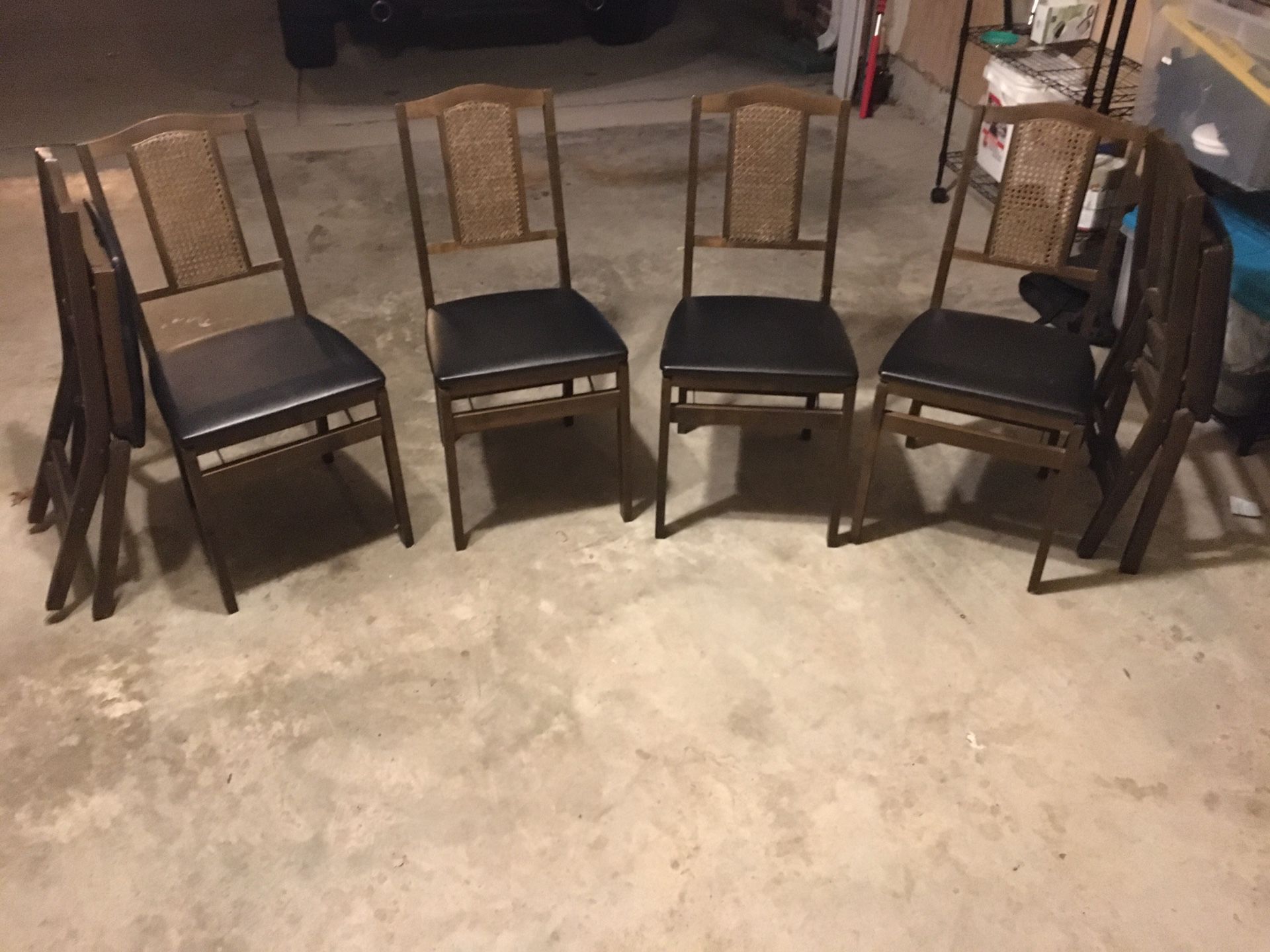 6 folding wooden chairs with leather seat!