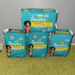 4 Pack 16 Diapers #6 Pampers Swaddlers 