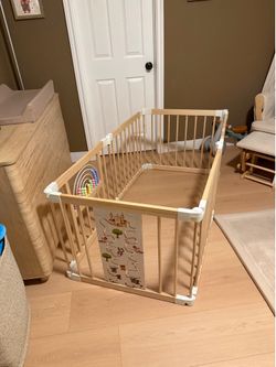 Infant wooden playpen