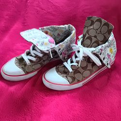 Brand new Coach high top size 7.5(fits like an 8)