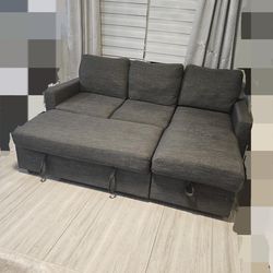 Grey sofa bed with storage