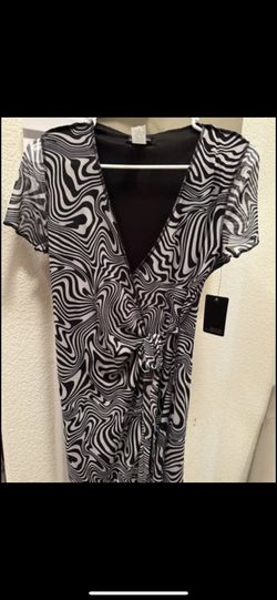 Caution to the Wind - Black women’s wrap dress - size M