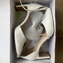 Closed Toed White Heel  