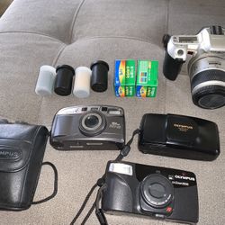  4 - 35mm Camera + Films (( Sold As Is)) Need Battery