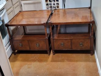 Pair of end table by baker furniture