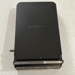 Netgear Modem With Adapter And Coaxial Cable