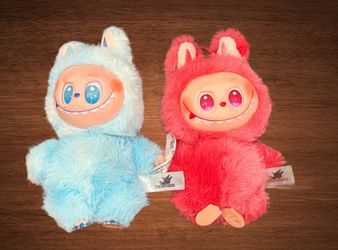 POP MART THE MONSTERS KEY CHAIN PLUSH ANIMAL.MOVES  HEAD ,FEET AND HEAD. (2monsters) 7”