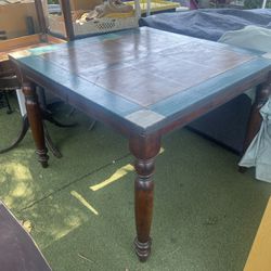 Tall dining room table with painted top