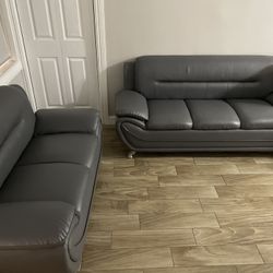 Brand New Sofa And Loveseat. Available In Black Gray Red White 