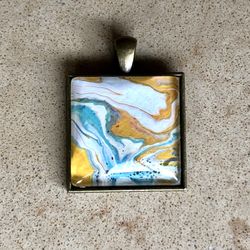 🟠 Original pour paint art framed in an antique gold setting with glass covering - pendant 