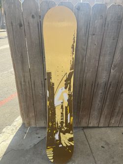 SNOWBOARD 58 INCHES.$30