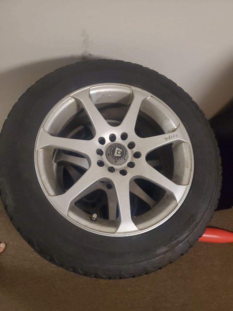 Less then 6 month old winter tires with 5 lug universal rims had them on Nissan altima