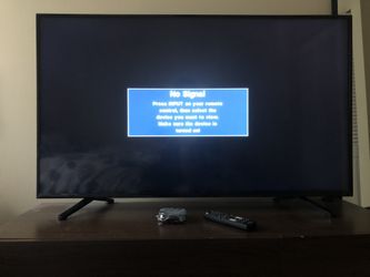 Insignia 50’ with roku and remote BARELY USED!! collecting dust...