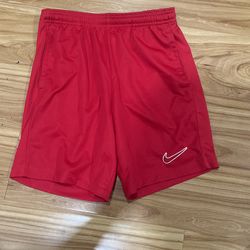 Nike athletic shorts, red, size M 10/12 youth